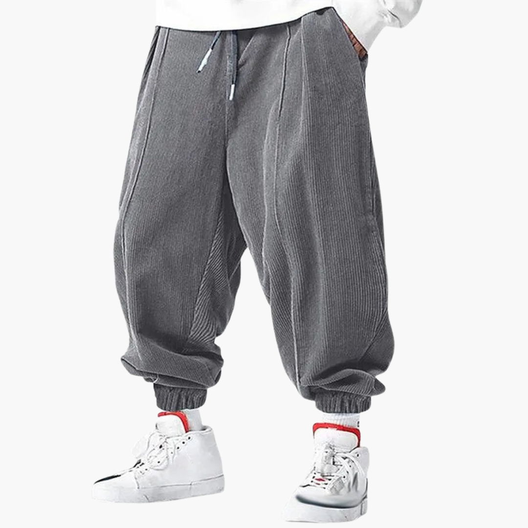 Men's brown corduroy straight-leg pants with elastic drawstring waistband and cuffed hem