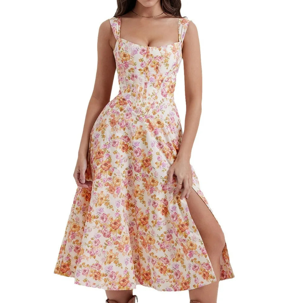 Floral jacquard midi dress with structured bustier bodice, soft straps, and side slit in romantic garden style