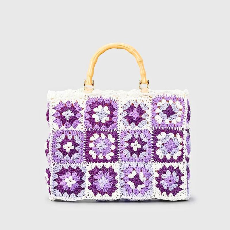 Handmade boho crochet tote bag with woven bamboo handle, eco-friendly sustainable yarn, bohemian style