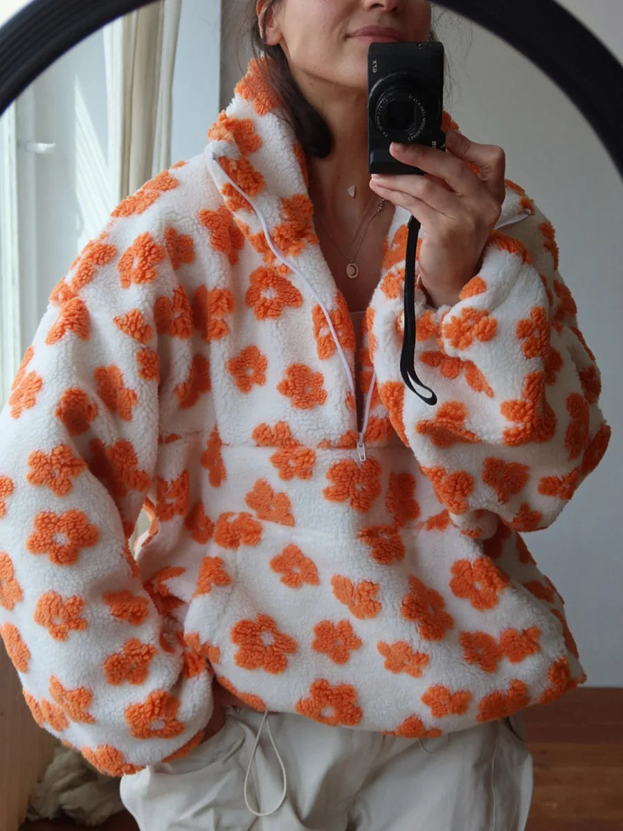 Women's oversized sherpa half-zip pullover in cream with bold retro floral print and cozy high-pile fleece