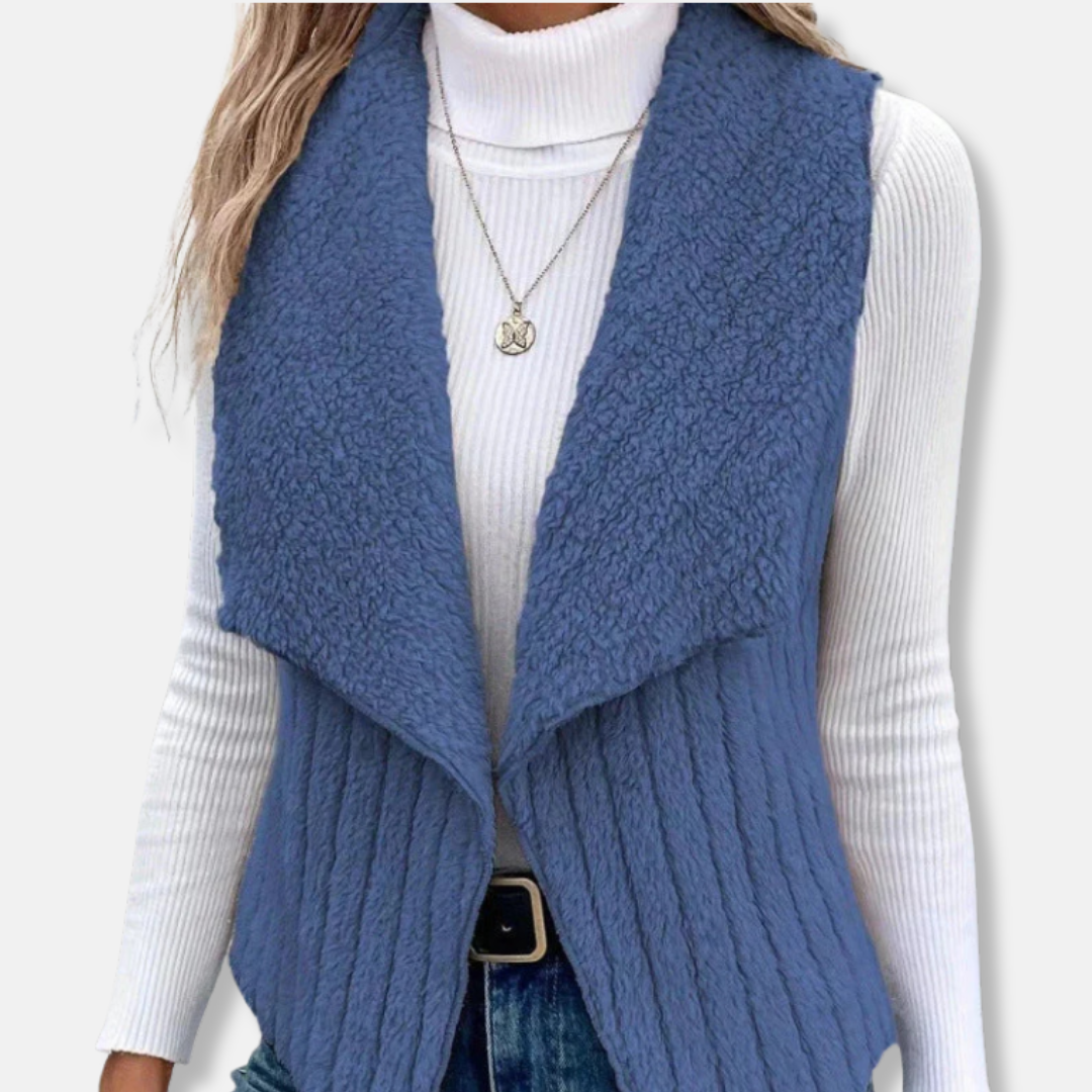 Women's sleeveless knit vest with plush shawl collar, hip-length relaxed open-front silhouette