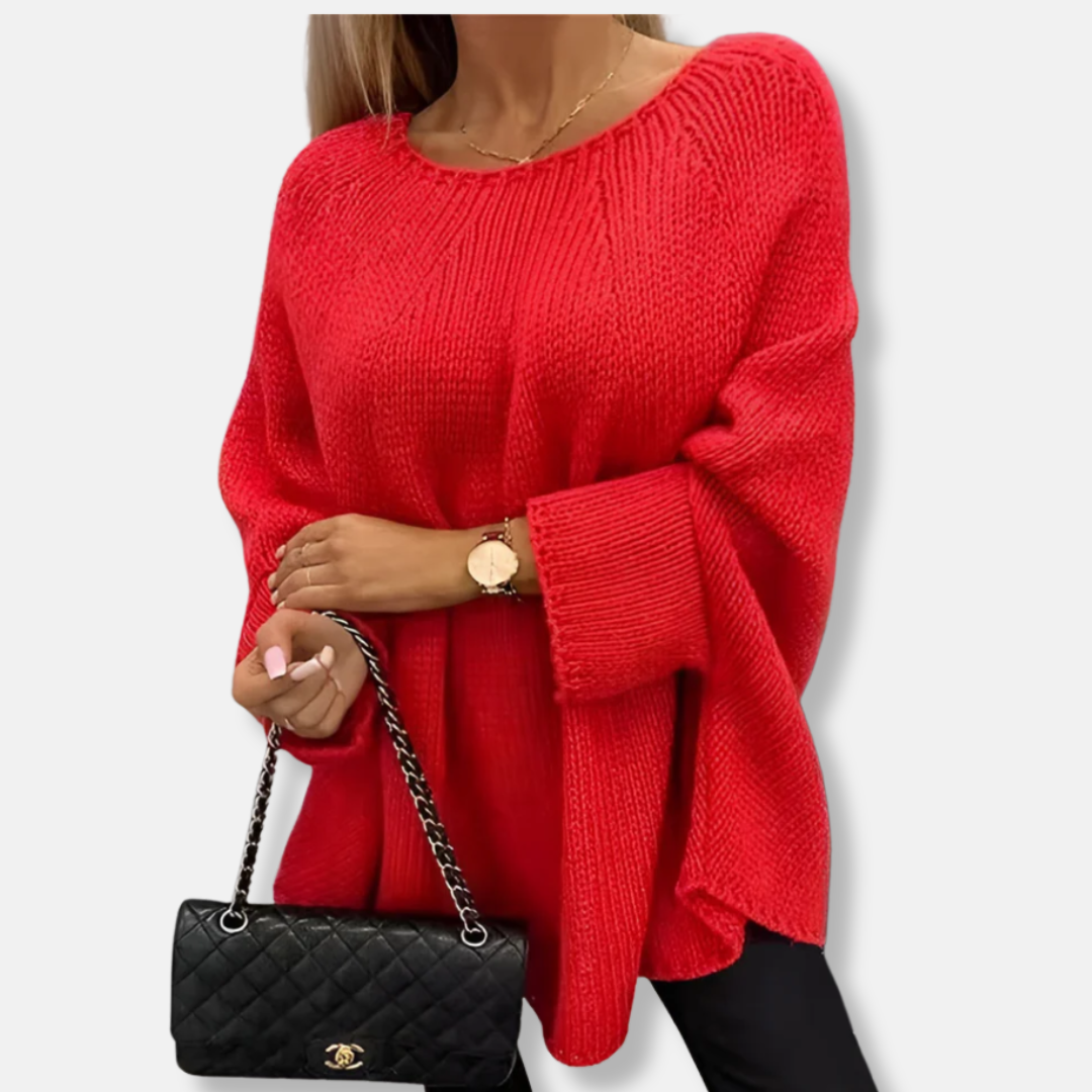 Women's chunky knit oversized tunic sweater in neutral tones with relaxed batwing sleeves