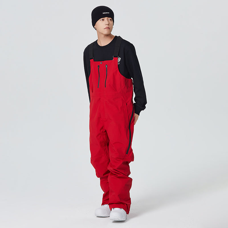Men's black bib-style snow pants with 10K waterproof membrane and adjustable suspenders for snowsports