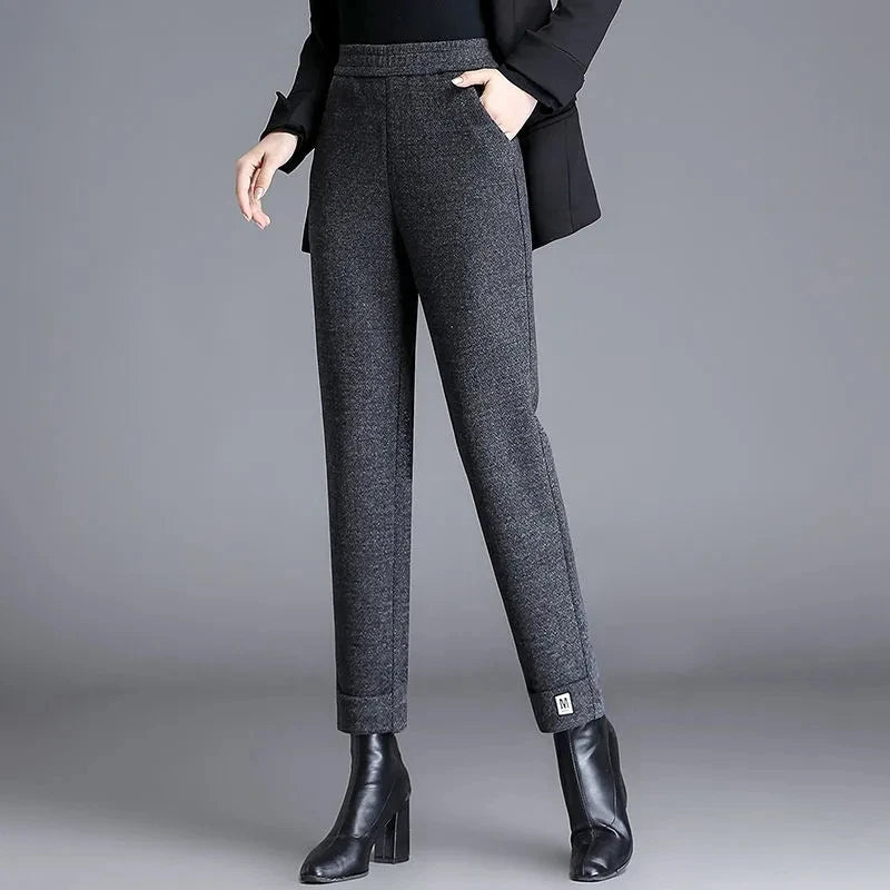 Herringbone wool slim-fit trousers, high-waist tailored cut with stretch, versatile work-to-evening style