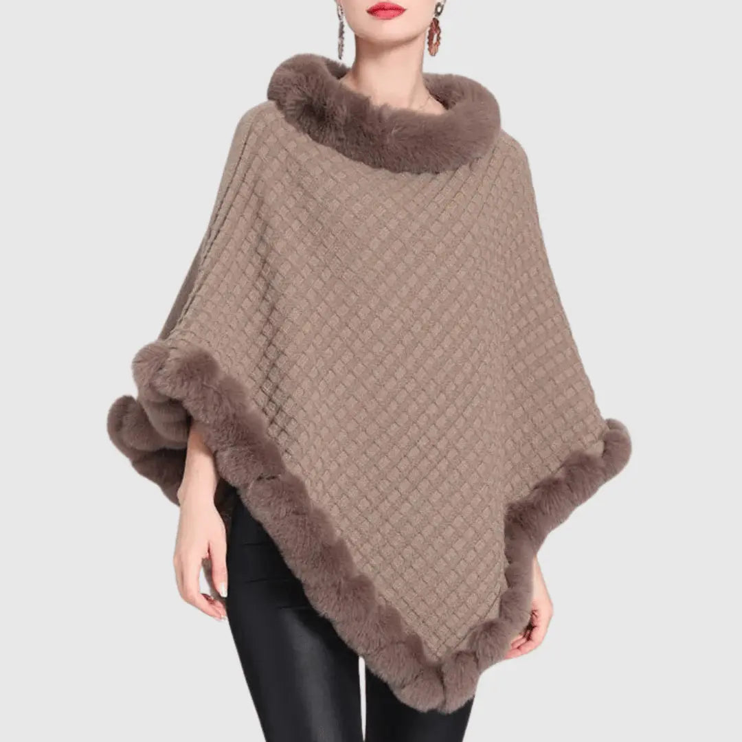 Women's chunky cable-knit poncho with faux fur trim, cozy acrylic weave in neutral tones