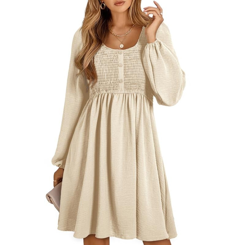 Valore smocked empire waist A-line dress in breezy style with flexible forgiving bodice for women