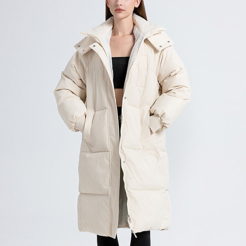 Women's long puffer jacket water-repellent fleece-lined pockets flattering winter silhouette