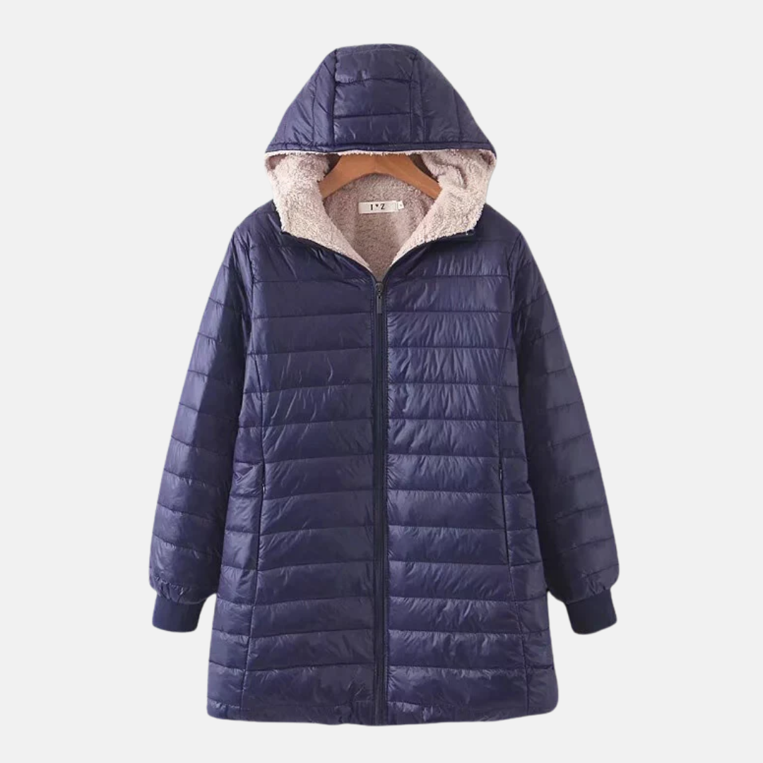 Women's mid-length quilted coat with attached hood, fleece-lined insulation, and ribbed cuffs for everyday wear