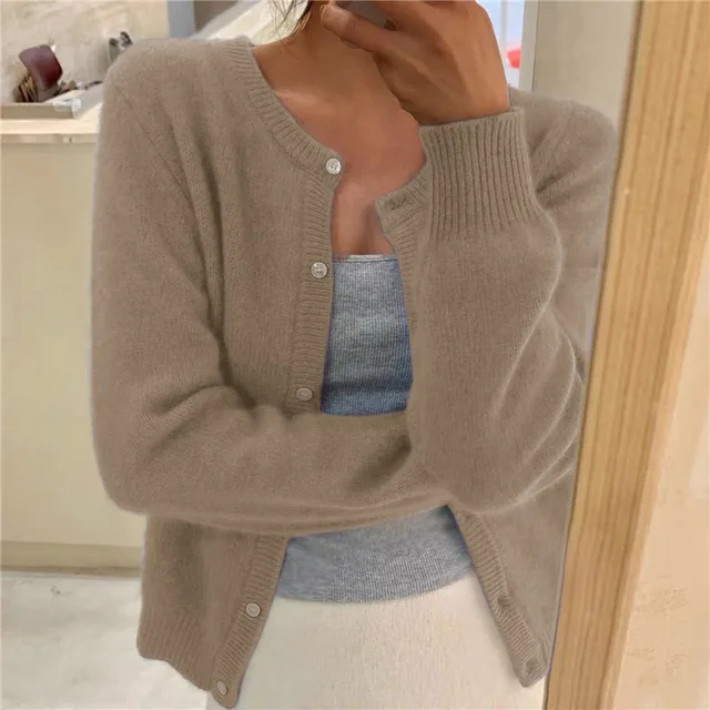 Women's cozy cream button-up cardigan relaxed silhouette long sleeve winter layering essential
