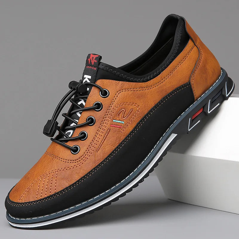 Men's low-profile PU leather sneaker with textile upper and structured outsole for everyday comfort