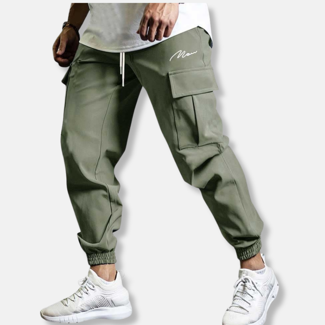 Men's relaxed fit cargo jogger pants with elastic waist, side pockets, and ankle-length silhouette