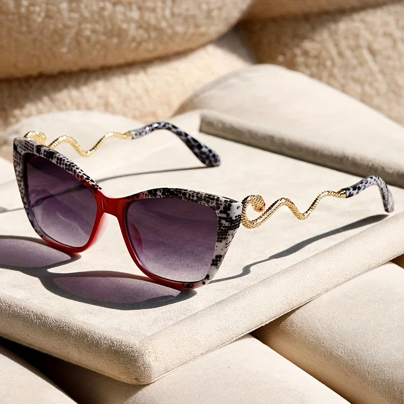Oversized cat-eye sunglasses bold acetate frames sculpted snake arms UV400 protection edgy fashion eyewear