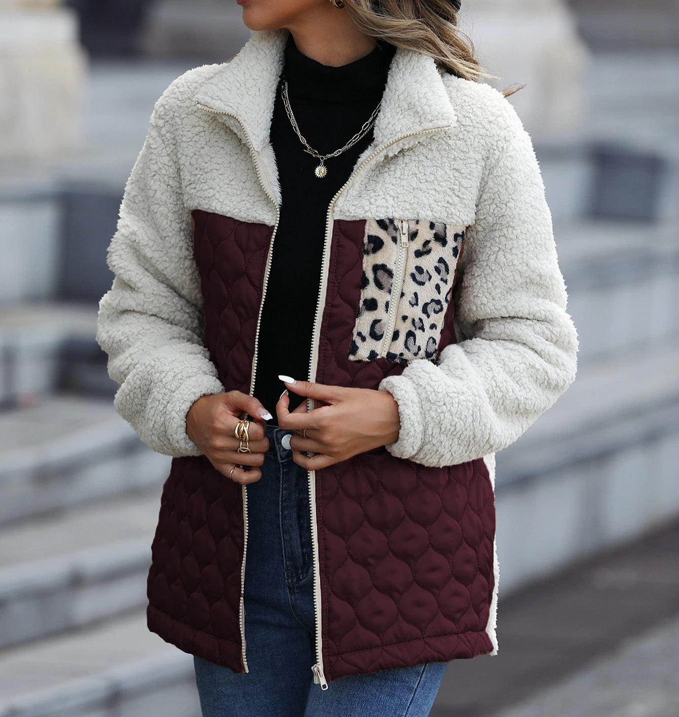 Women's black quilted sherpa jacket with leopard print zip pocket and satin panels stand collar