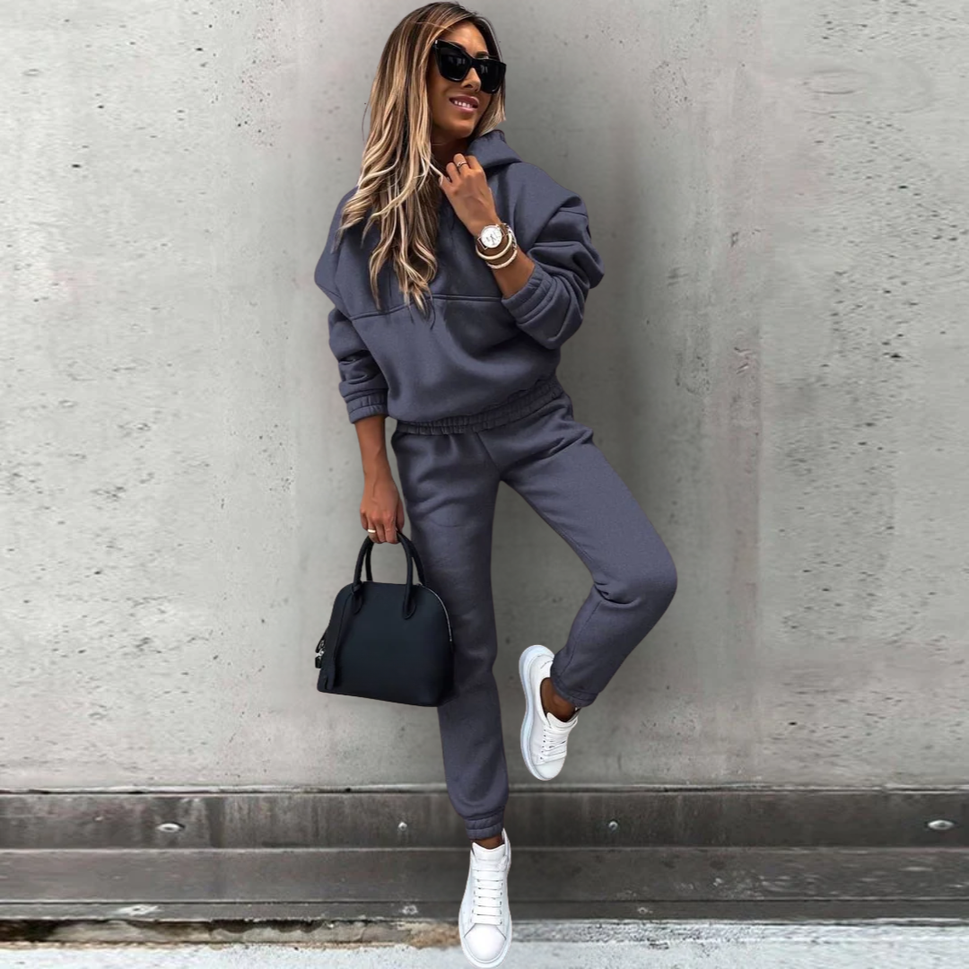 Women's stretch fit hoodie and joggers matching set in casual athleisure style with relaxed silhouette