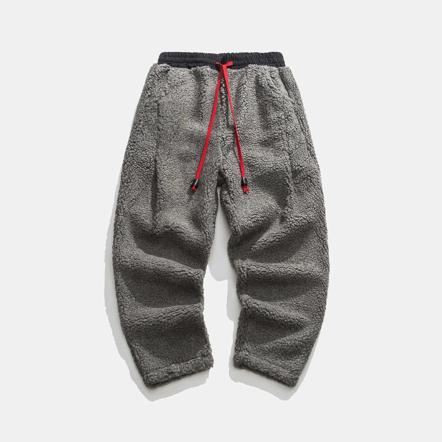 Tapered sherpa fleece jogger pants with deep pockets, ultra-soft textured finish for cold weather comfort