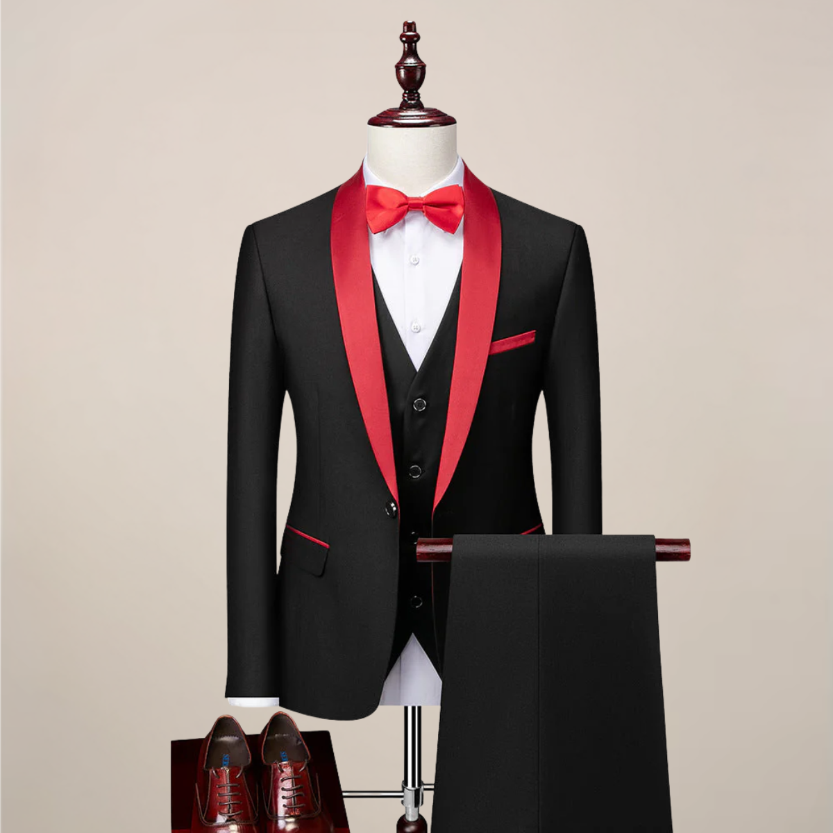 Men's slim fit black three-piece dinner suit with contrast shawl lapels, waistcoat, and tapered trousers