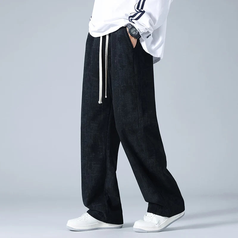 Lucid wide-leg corduroy jogger pants in textured fabric with elastic drawstring for elevated casual style