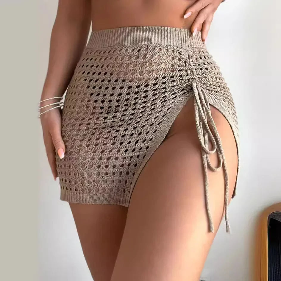 Beige open knit mini cover-up with ruched sides and sculpting ribbed waistband for women