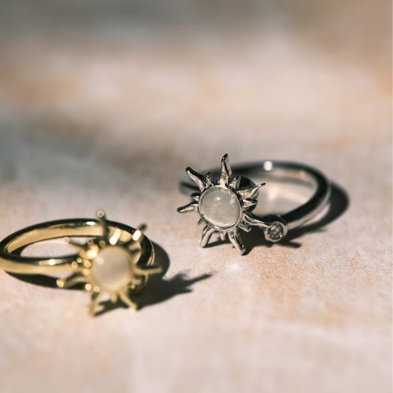 Stainless steel anxiety spinner ring with rotating sun detail for stress relief and mindful grounding