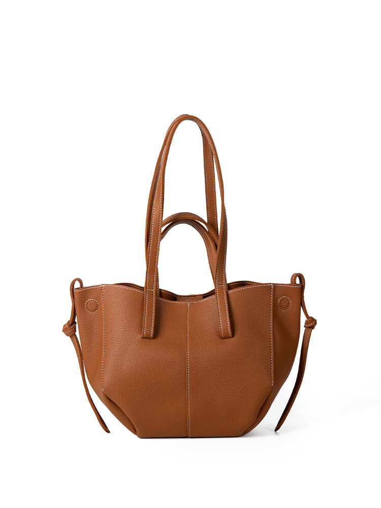 Women's vintage structured tote bag in pebbled finish with dual handles and adjustable shoulder strap