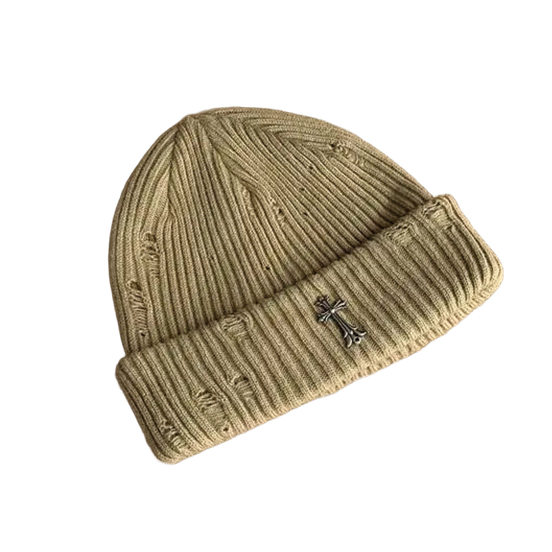 Black ribbed knit beanie with distressed finish and bold metal iron cross emblem for streetwear