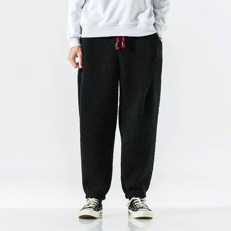 Thick lamb wool relaxed-fit winter pants in neutral tones for all-day cold weather comfort