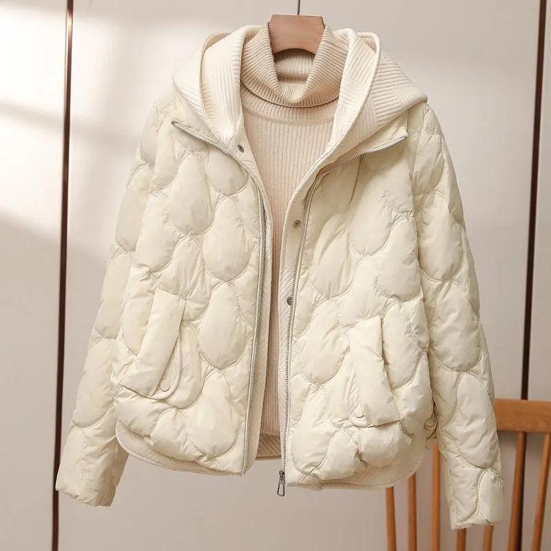 Women's puffer jacket with plush lining, flattering silhouette, cozy warmth, trendy winter style