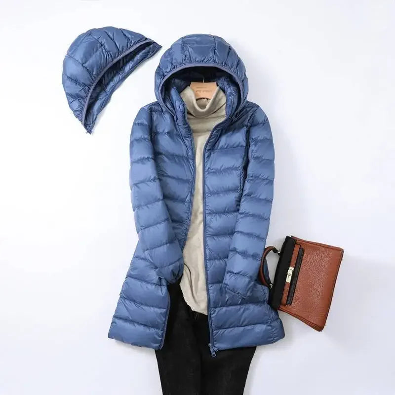 Women's black packable puffer jacket with removable hood, slim fit for outdoor and city wear