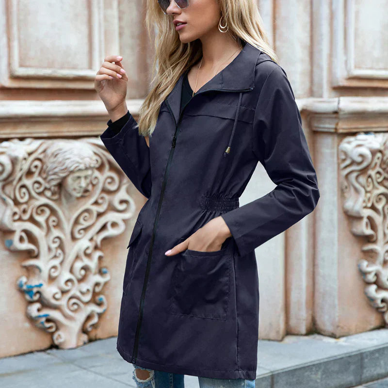 Women's lightweight water-repellent trench coat adjustable waist zipper closure long sleeve neutral tone