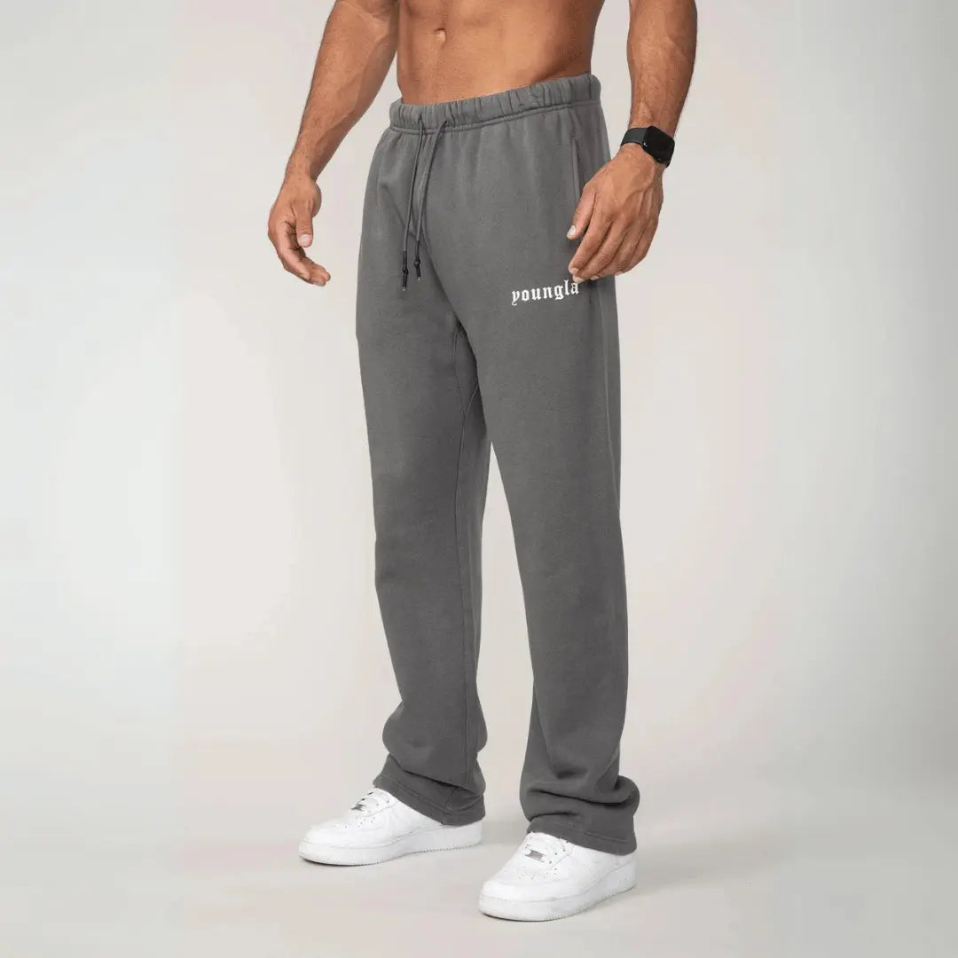 Men's classic fit fleece sweatpants with elastic waistband and adjustable drawstrings for everyday wear