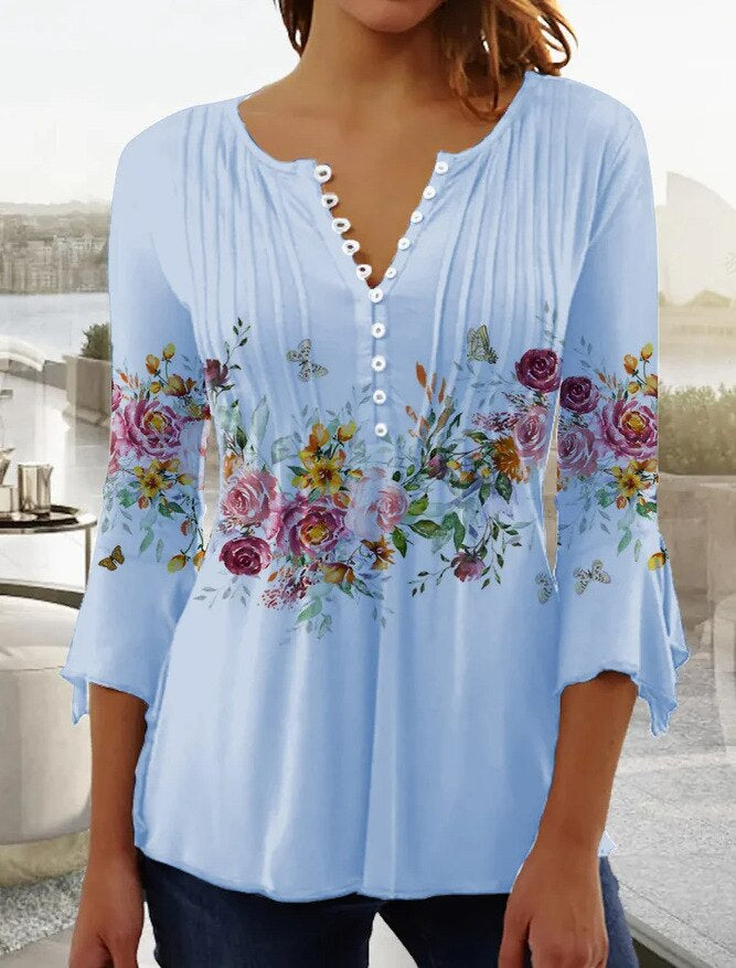 Women's ivory pleated blouse with scalloped V-neckline and front button detail for day-to-evening wear