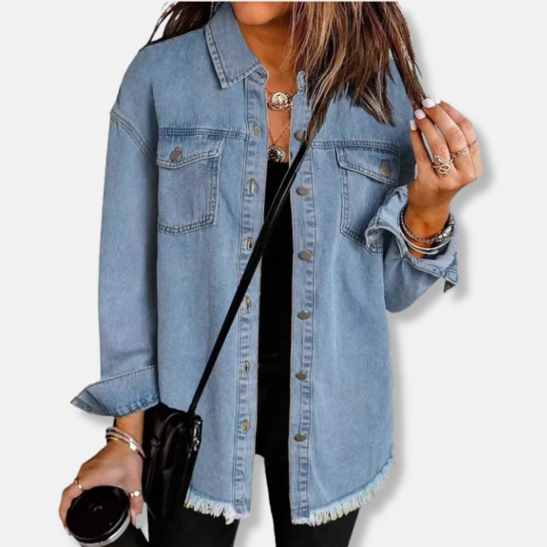 Women's oversized denim shacket with raw edge frayed hem and button front for casual layering