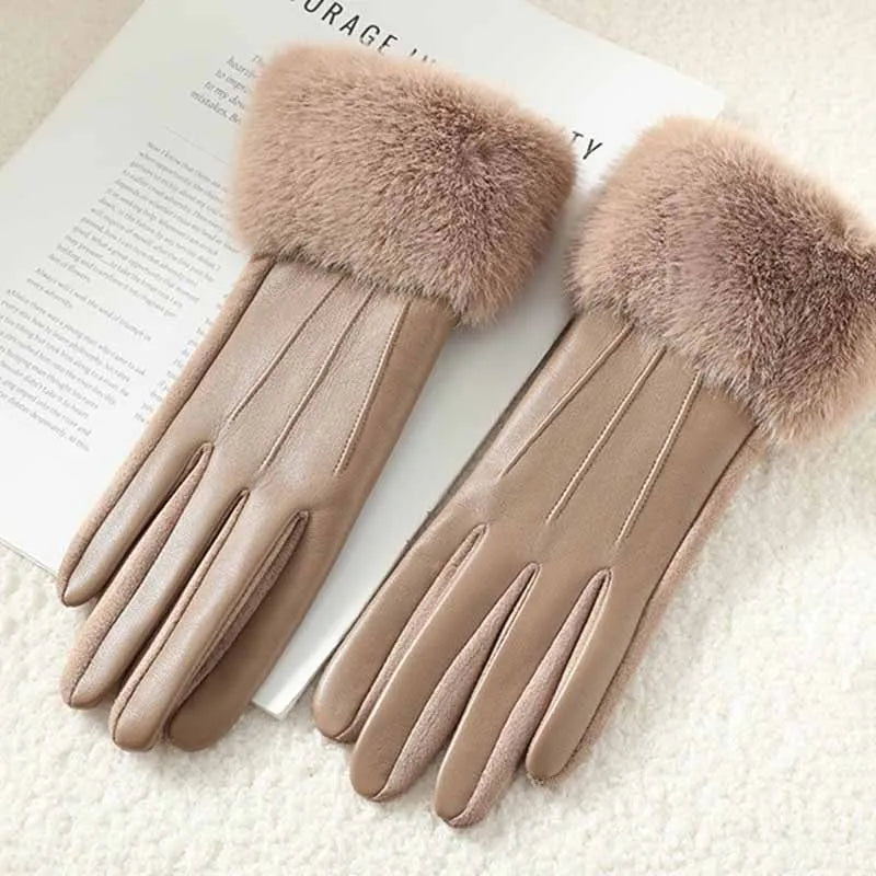Women's black faux leather gloves with fluffy faux fur cuffs and touchscreen-compatible fingertips