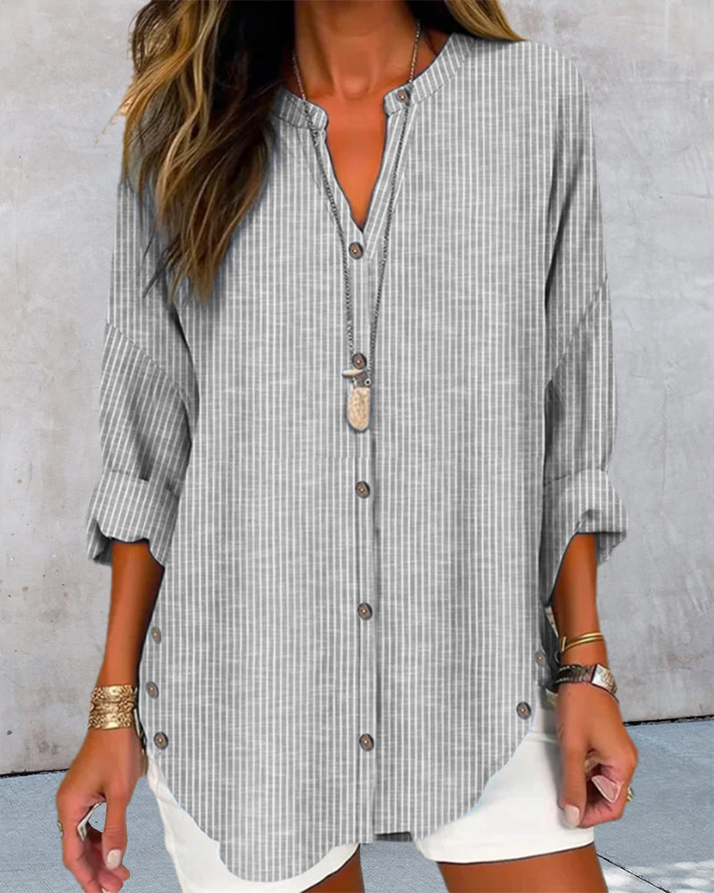 Women's striped V-neck top, classic casual-chic cut, flattering neckline for office or weekend wear