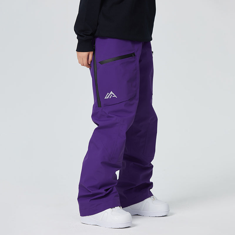 Women's waterproof snow pants in solid color with thigh vents, boot gaiters, and fully taped seams