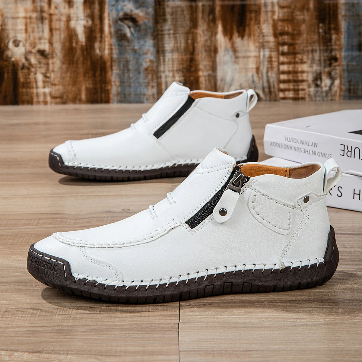 Women's vegan leather ankle boot with side zip, cushioned insole, and rugged textured outsole
