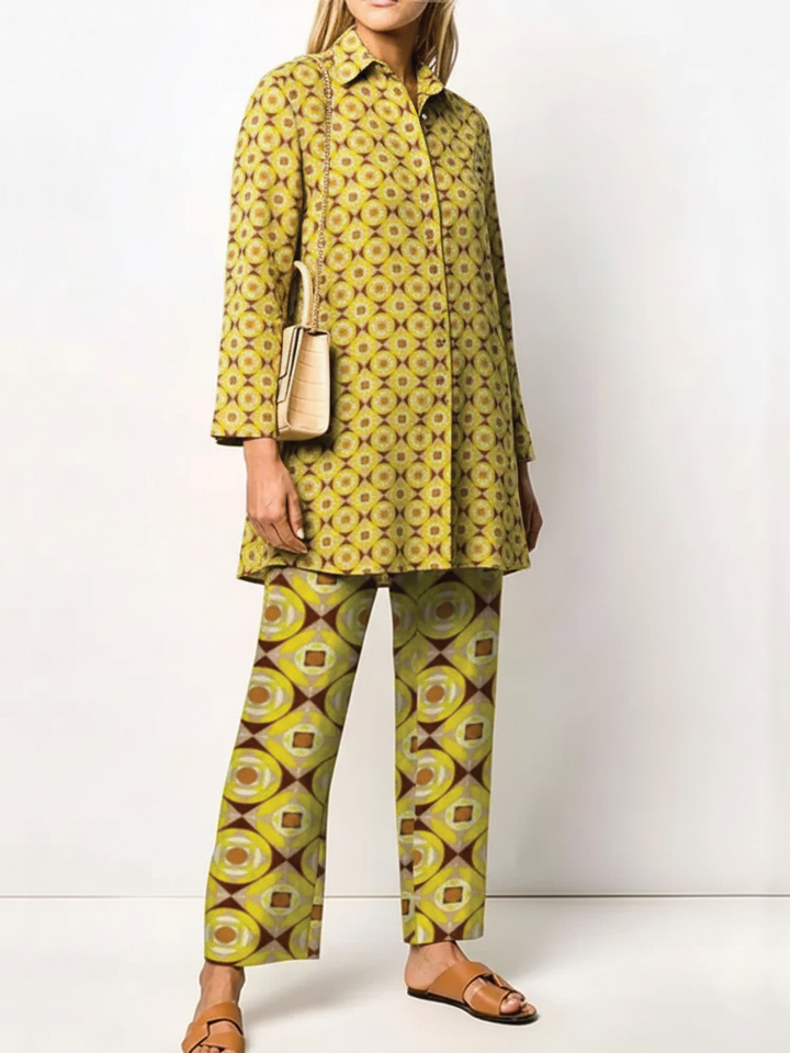Women's two-piece woven set with relaxed tunic top, straight-leg pants, and pointed collar