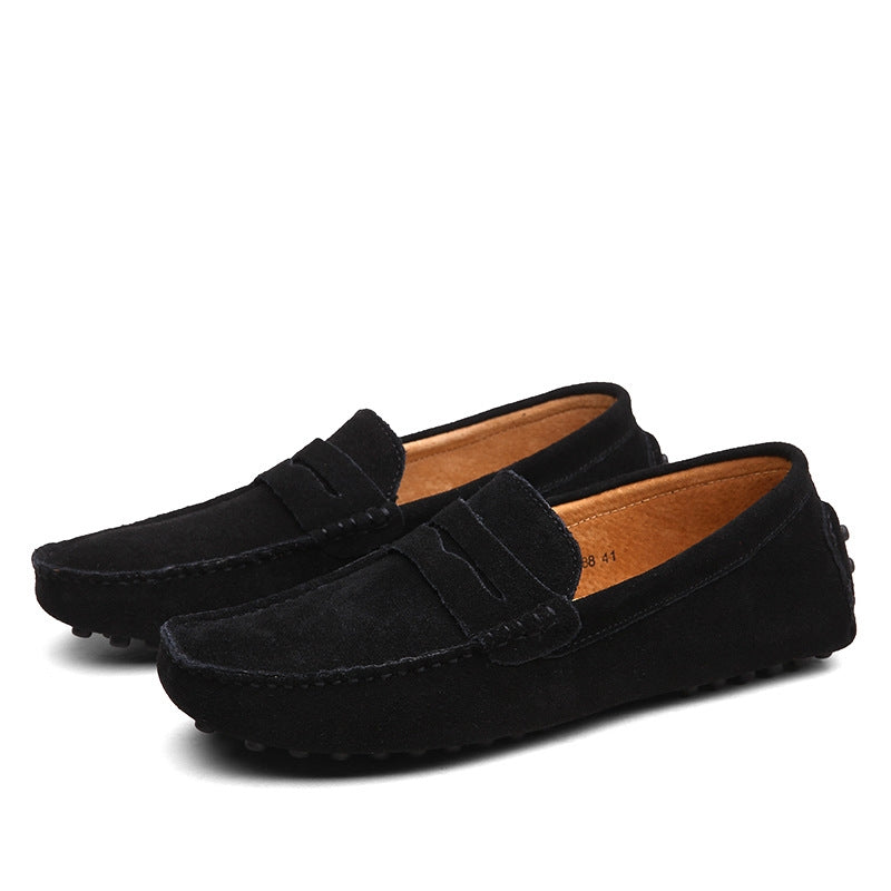 Men's brown suede loafers with cushioned lining, rubber grip outsole, and detailed stitching