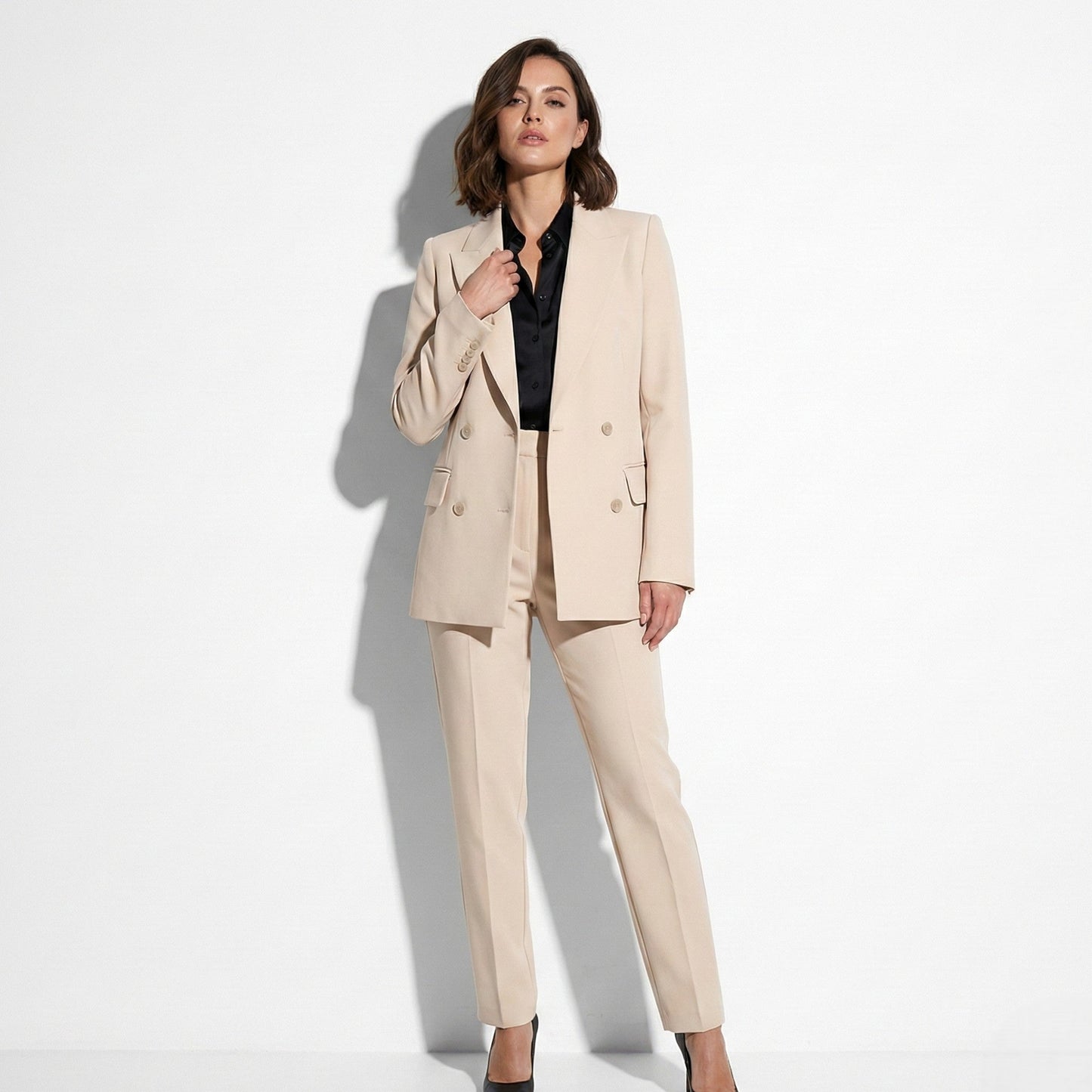 Women's tailored blazer and slim trouser two-piece set in premium soft fabric for polished work style