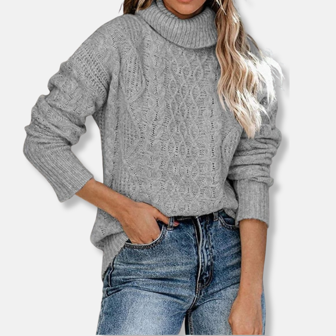 Women's cream cable knit turtleneck tunic sweater, relaxed fit with classic textured pattern