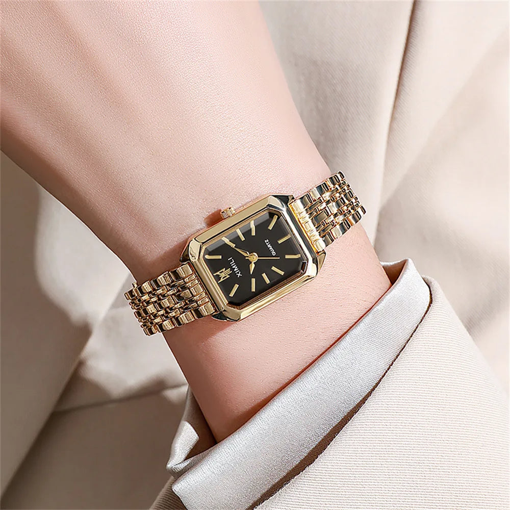Vivienne ladies dress watch gold-tone stainless steel band quartz 30M water resistant