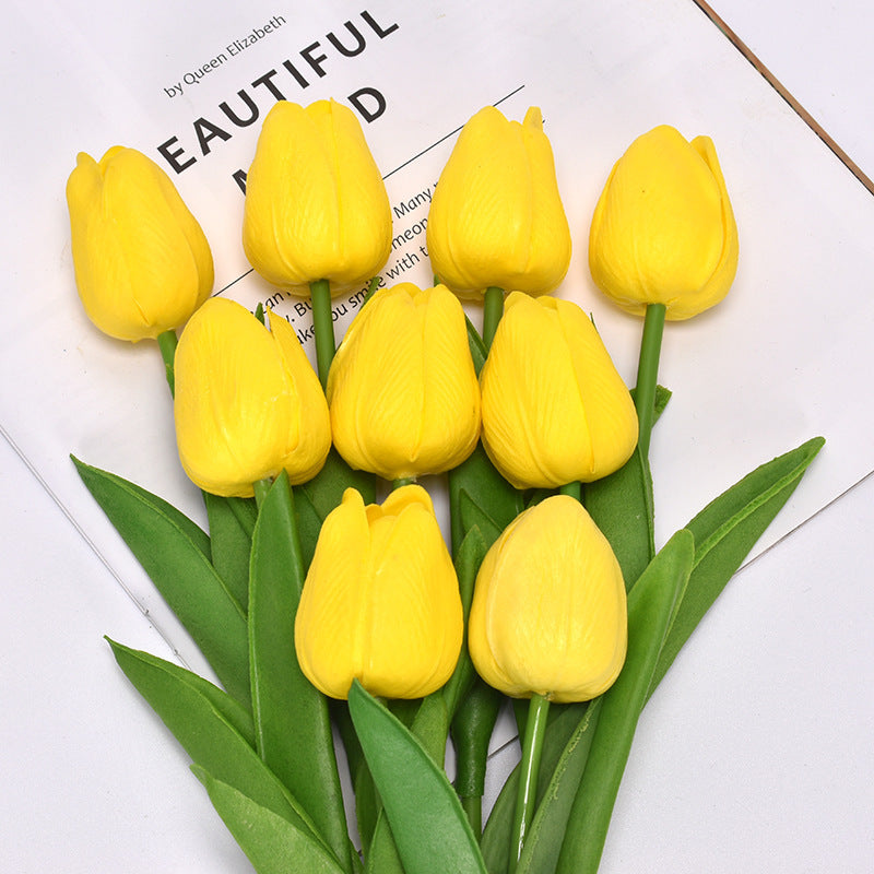 Yellow artificial tulip bouquet with realistic green leaf detailing and soft-touch lifelike petals