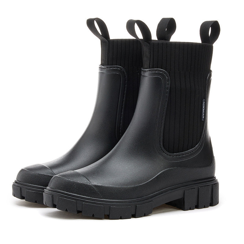 Waterproof rubber Wellington rain boots with non-slip sole, durable all-weather outdoor footwear