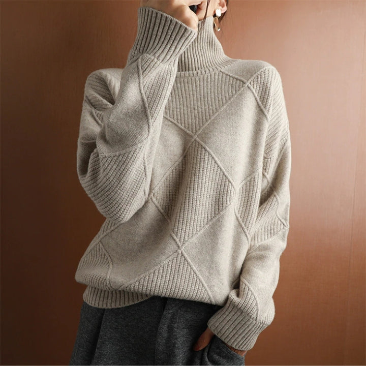 Women's oversized ribbed knit sweater in cozy neutral tones, relaxed silhouette for effortless layering