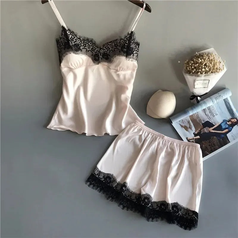 Black silk camisole and shorts sleepwear set for women with delicate lace trim detail