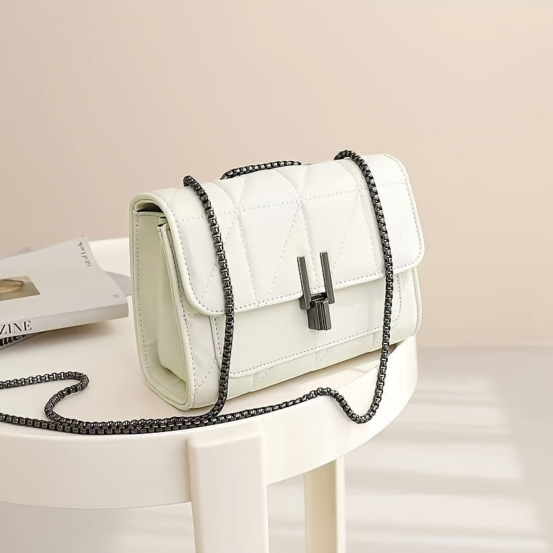Women's quilted crossbody bag with gold chain strap, structured silhouette for elegant daytime and evening wear
