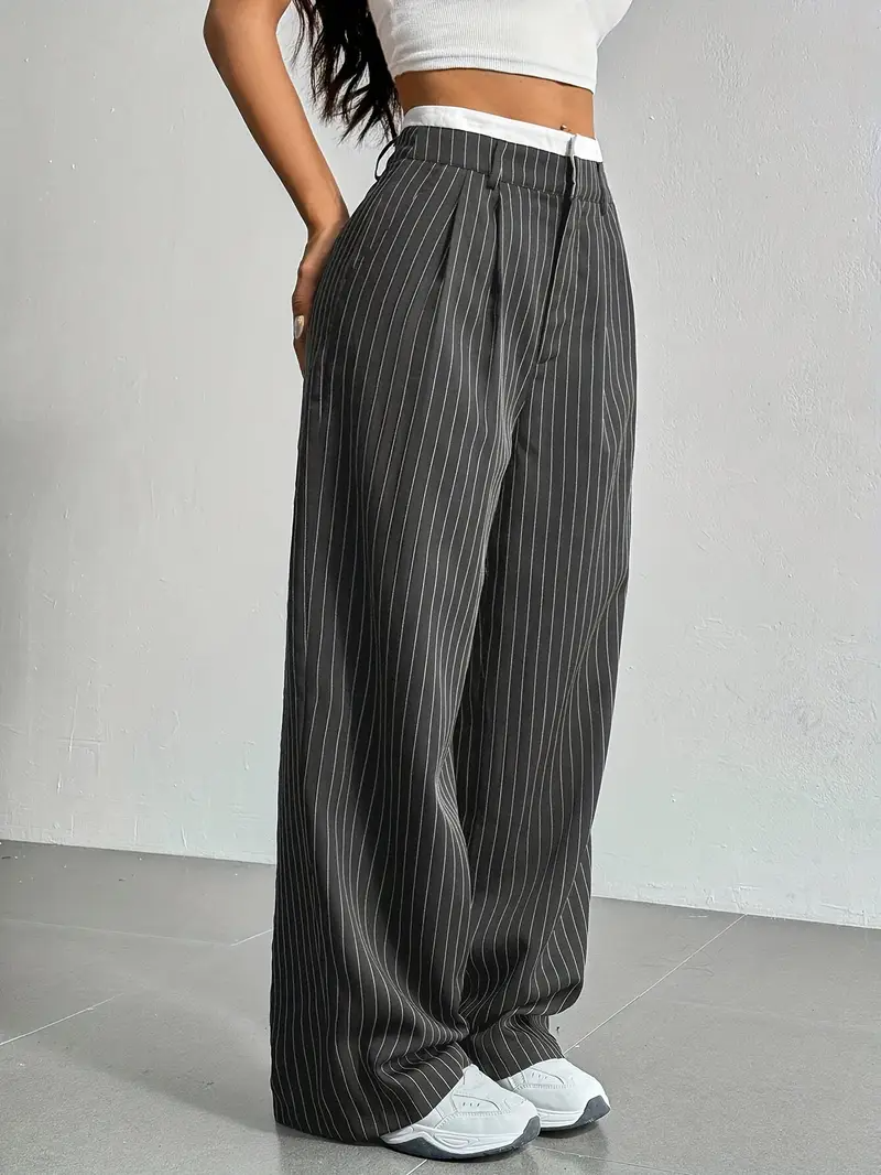 Navy blue pinstripe wide-leg trousers with elastic waistband, relaxed tailored silhouette