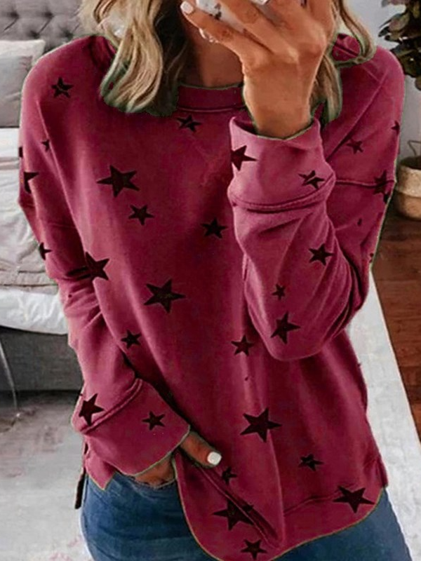 Women's loose fit crewneck sweatshirt with allover star print pattern for casual everyday wear