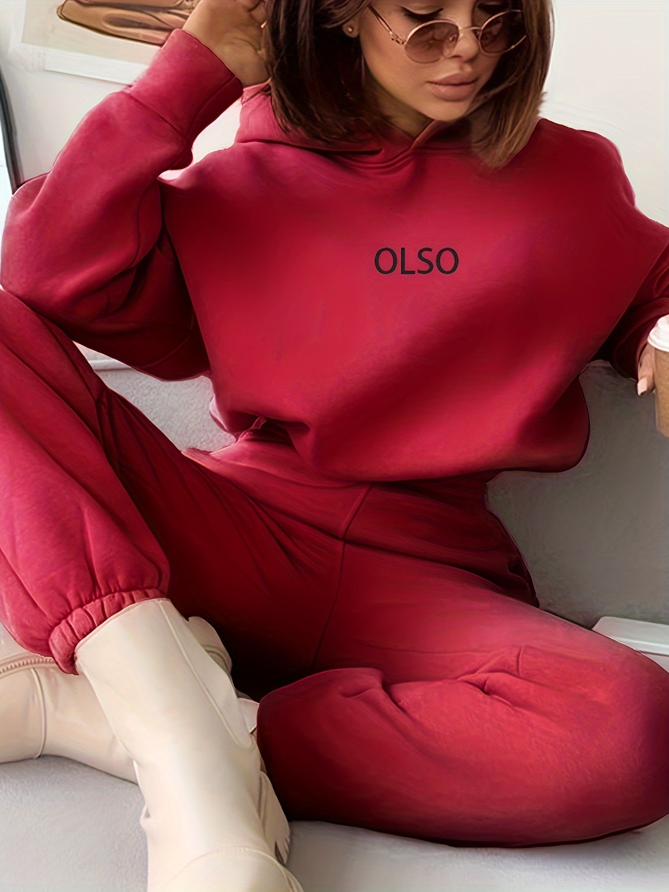 Women's coordinated hoodie and sweatpants tracksuit set in sustainable fabric for casual everyday wear