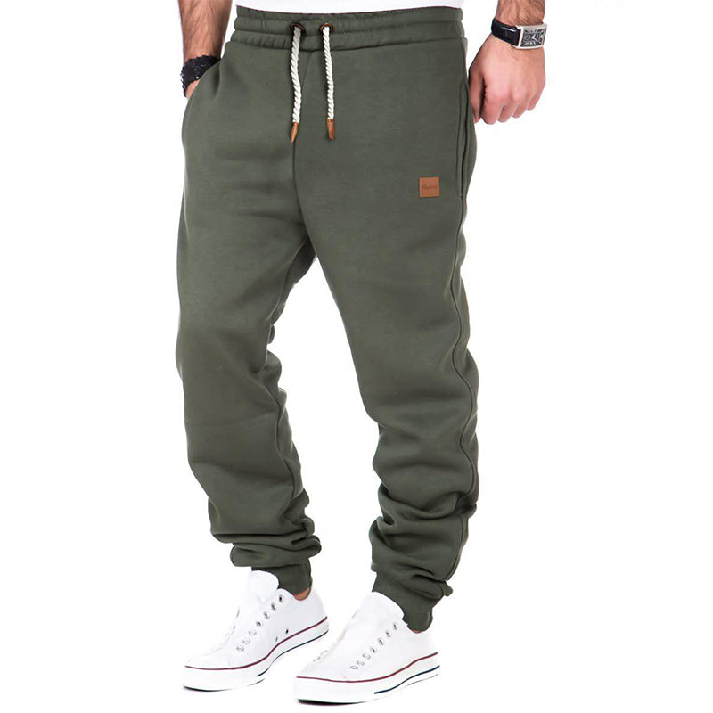 Men's gray fleece sweatpants with drawstring elastic waistband, relaxed fit for all-day comfort